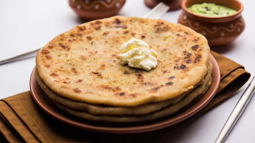 Kasuri methi Aloo parathas on a plate