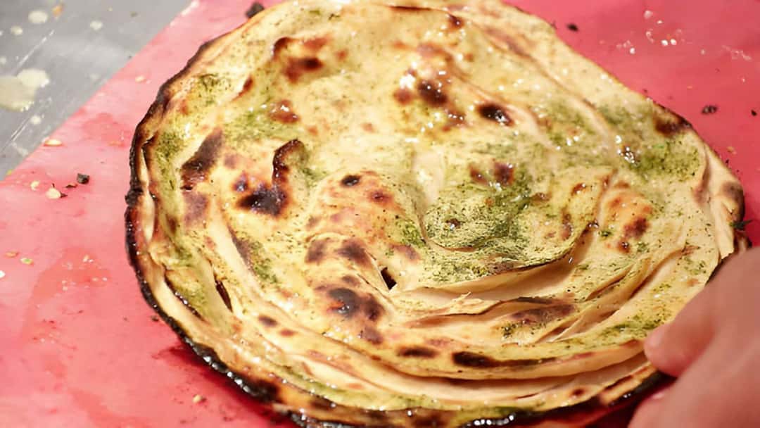 Layered missi paratha on a flat surface