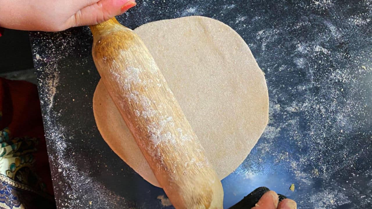 Rolling dough on a floured surface